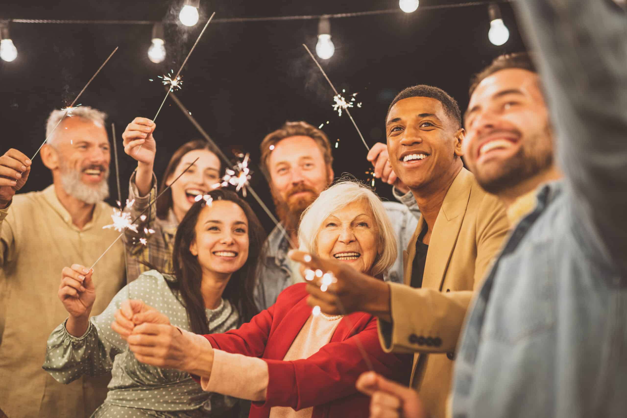 Storytelling footage of a multiethnic group of people dining on a rooftop. Family and friends make a reunion at home